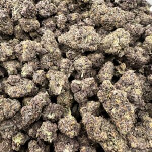 Dippin Dot top-shelf flower with premium trichome frosting, dense bud structure, and cream-purple coloring throughout