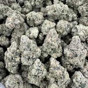 Kami Kush top-shelf flower showing hand-selected buds with refined trichome-rich crystal coverage and dense calyx structure in silvery-white and sage-green